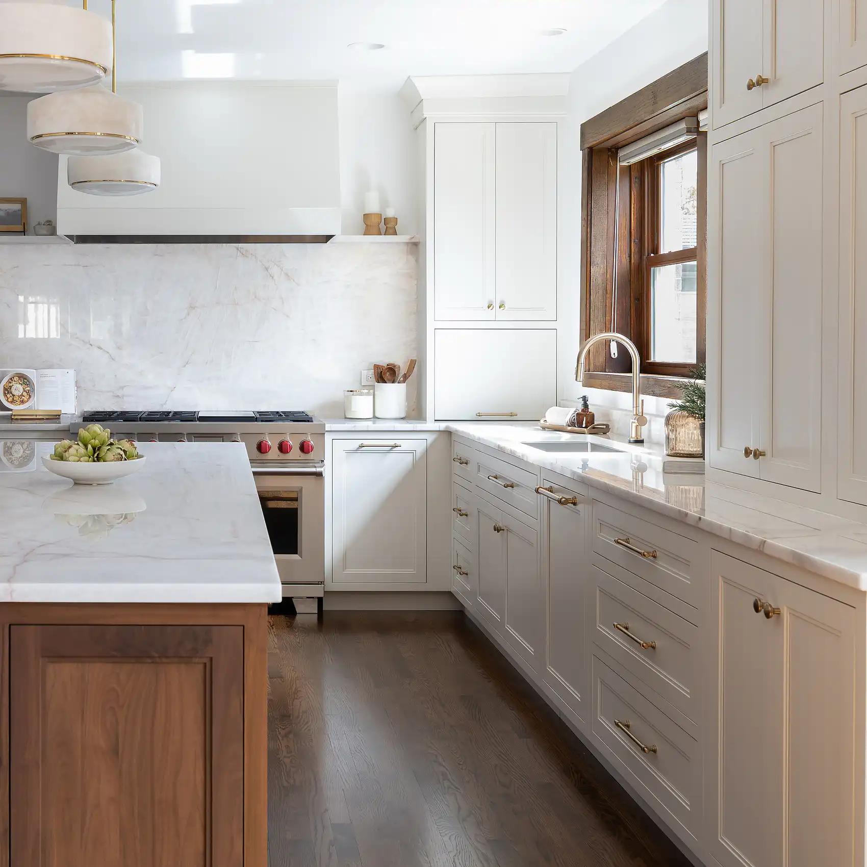 walnut-cabinets-marble-countertop-stainless-range-brass-accents-kitchen-remodel